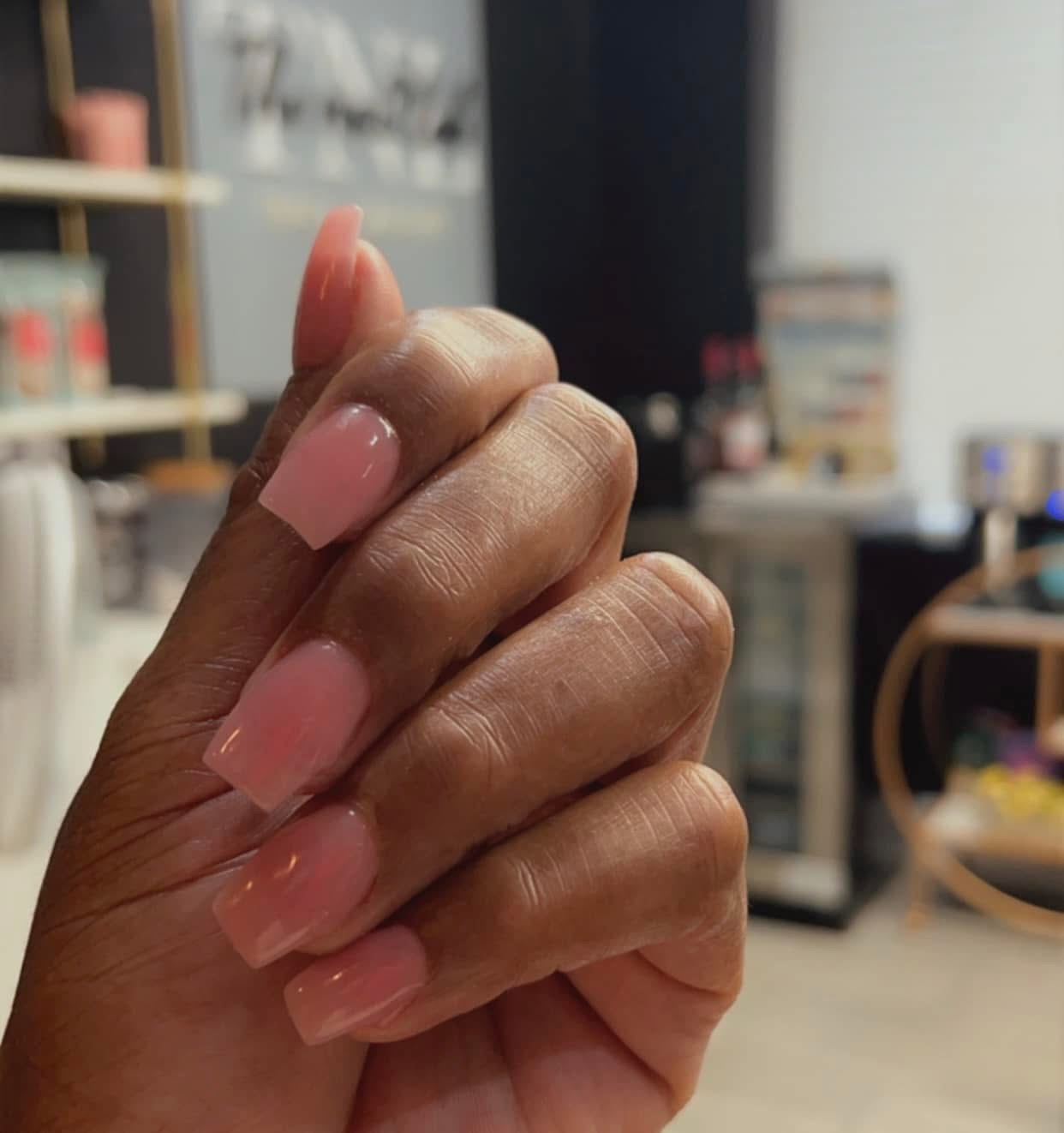 The nail lab nail studio logo